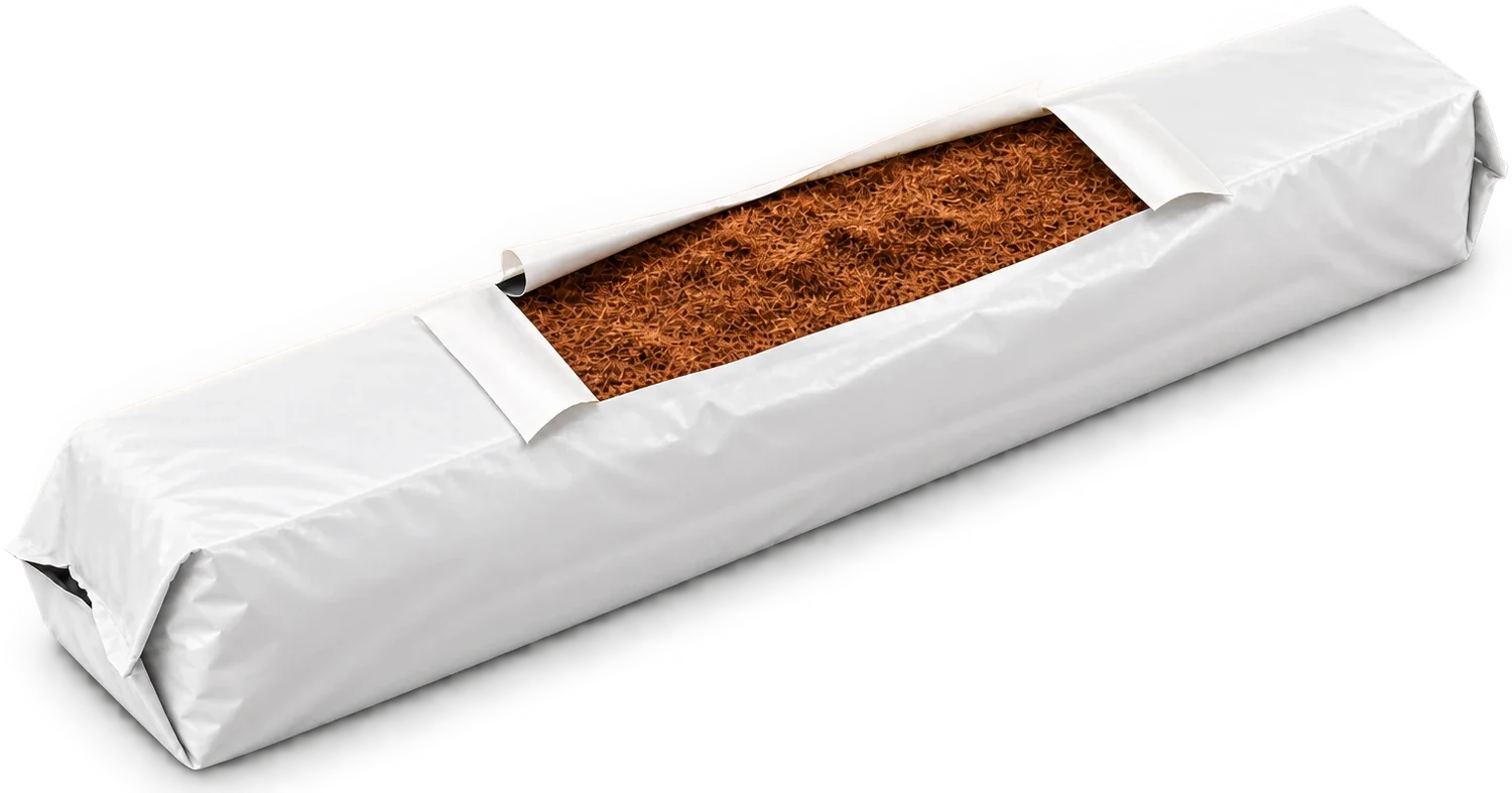 A coco slab in white film, cut open on top to show the substrate inside